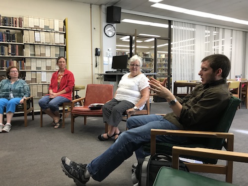 Vi Dutcher, in white, leads the daily centering time at Kairos Place, for EMU faculty and staff.