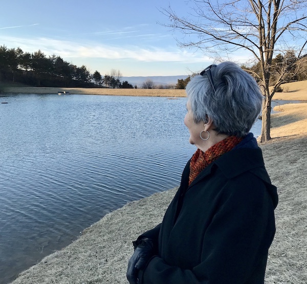 Standing in winter landscape.