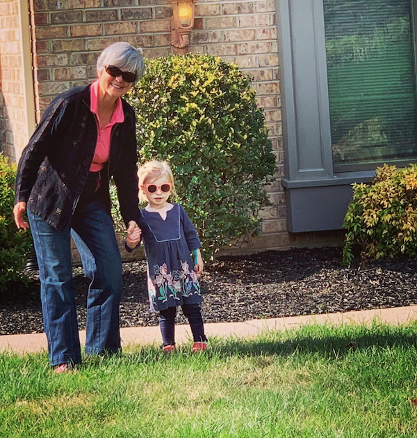 Lydia and Grandma ready to explore the front yard as we walk down the street to the EMU front yard on Homecoming weekend.